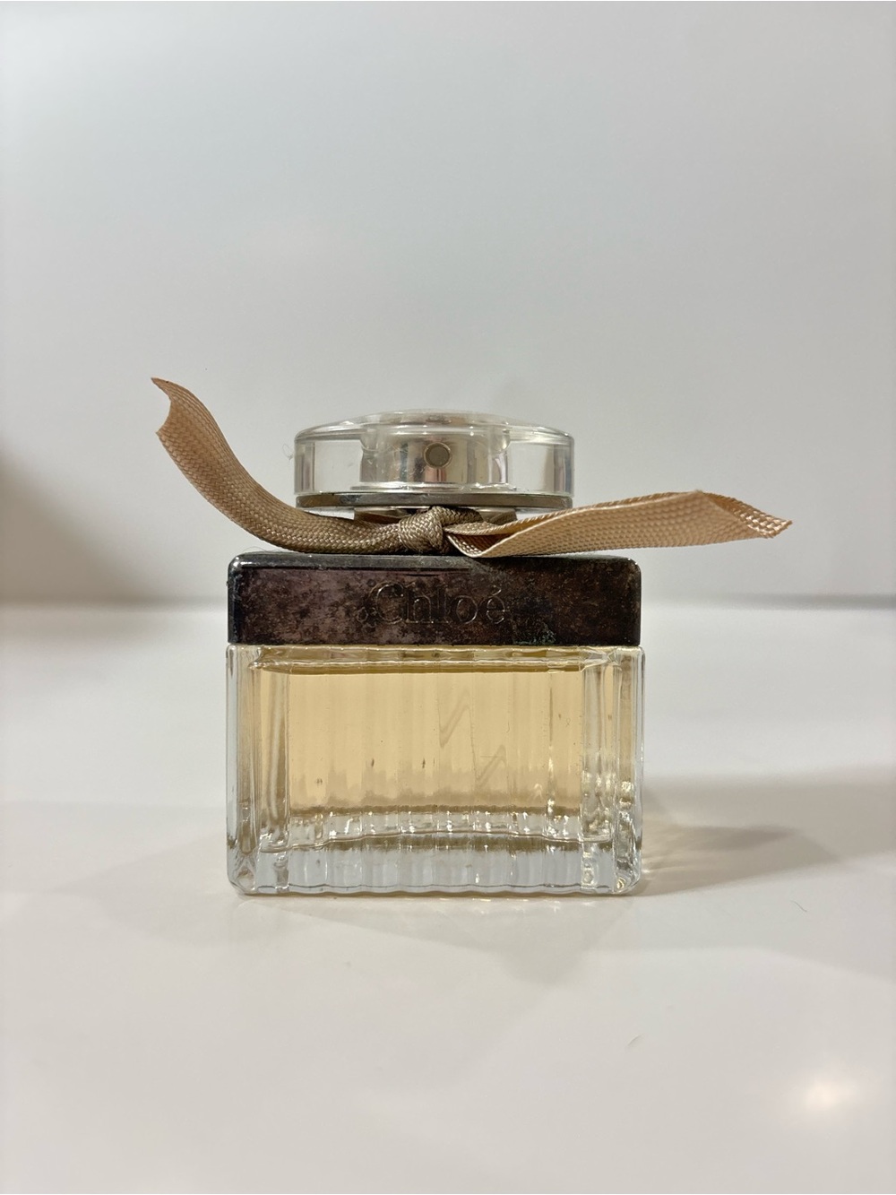 Chloe Eau de Parfum Bottle with Beige Bow and Clear Glass